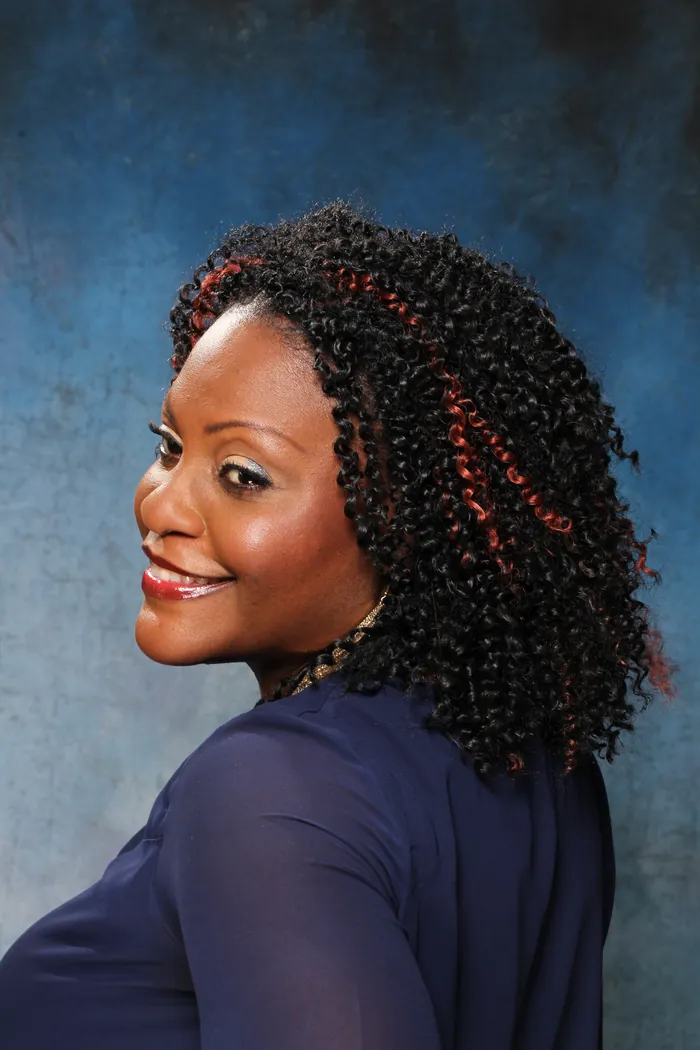 Two-strand twists with red accents, side view